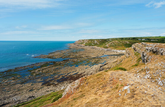Rugged limestone cliffs near Port Enyon point, Wales.