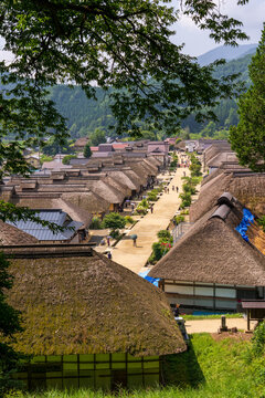 Historic streetscape of Ouchi-juku lined with traditional thatched-roof houses in Fukushima