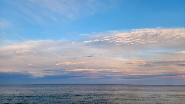 Stratocumulus and Altocumulus clouds are the most common cloud formations seen over the Mediterranean Sea during an evening following a rainy day. As a storm system departs and the weather clears