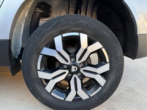 Mallorca, spain, august 30, 2026, dacia car wheel with continental tire, demonstrating modern vehicle design and component details