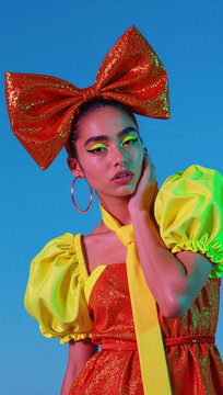Woman big orange bow portrait