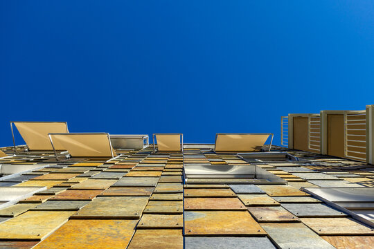 Contemporary architecture building facade with colorful slate cladding