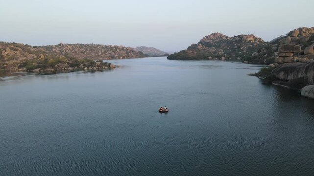 Coracle boat ride in sanapur lake in hampi