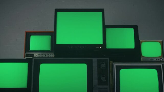 Cinematic Zoom Out From Stacked Retro Televisions With Green Screens