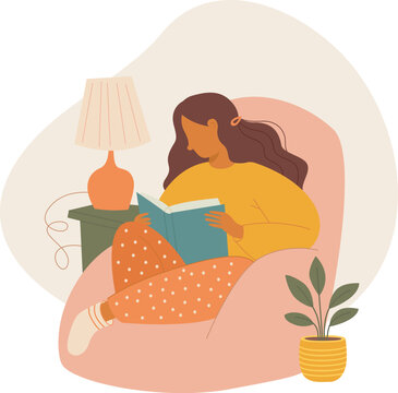 Woman reading a book enjoying quiet relaxing moment offline