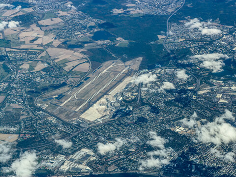 aerial landscape view of area around D&uuml;sseldorf Airport (IATA: DUS, ICAO: EDDL) with runways, taxiways, tarmac, terminals and hangars. D&uuml;sseldorf is the capital city of North Rhine-Westphalia state