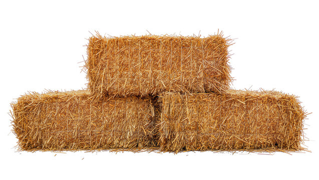 Three rectangular golden hay bales stacked, isolated on transparent background