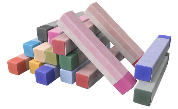 Stack of soft pastel chalk sticks in muted pink, blue, green, yellow and grey tones for drawing and sketching. Artist supplies close-up