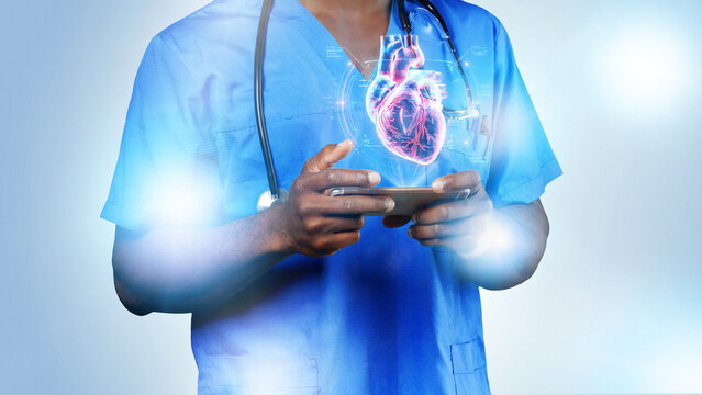 Medical professional learns about heart health using technology while holding a smartphone