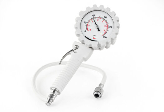 Handheld air pressure gauge tool with dial and flexible hose isolated on white background