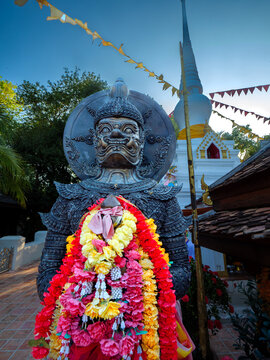 Dark Guardian Statue at Traditional Thai Buddhist Temple