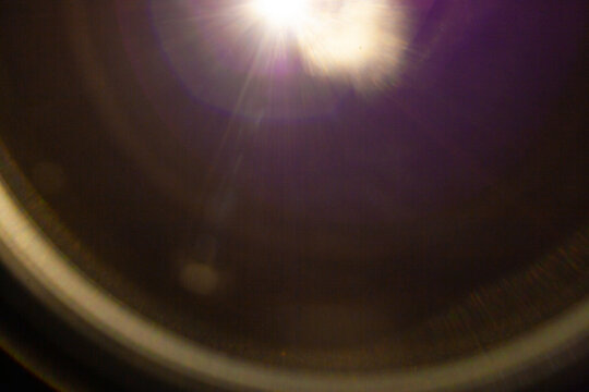 Sun flare on the black background