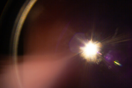 Sun flare on the black background