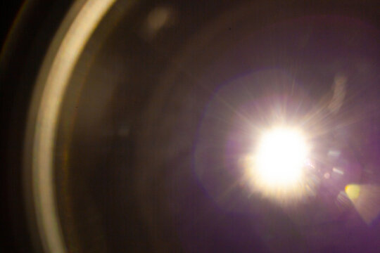Sun flare on the black background