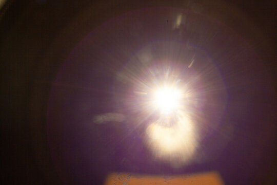 Sun flare on the black background
