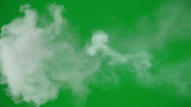Premium isolated white smoke and vapor cloud element on green screen chroma key for professional visual effects and video editing
