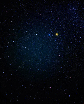 Night sky with shining stars and a galaxy in space.