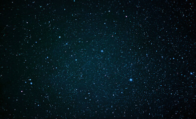 Fototapeta premium Night sky with shining stars and a galaxy in space.