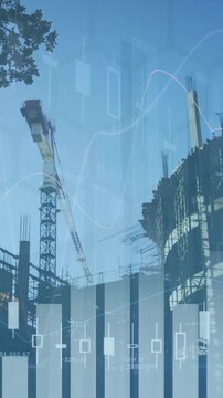 Animation of multiple graphs over low angle view of under construction building against sky