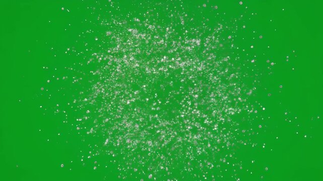 High-speed white particle collision explosion effect isolated on green screen for professional video editing and visual effects production