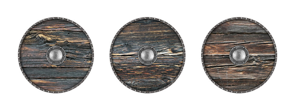 Group of old wooden round shield isolated on white background