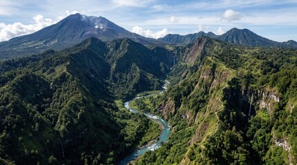 Obraz premium Breathtaking Aerial View of a Majestic Volcano Overlooking a Lush Green Valley with a Winding River and Waterfalls