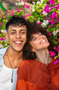 Married couple celebrates their love and bond through a quiet, intimate moment in a garden