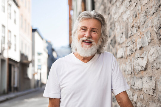Senior man in the city urban backgroud having great time
