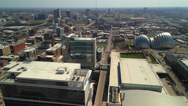 Aerial view of downtown Kansas City with the Power and Light Building, modern offices, convention facilities, and urban streets