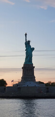 Statue of Liberty at dusk in New York Harbor © Lumen&Lines