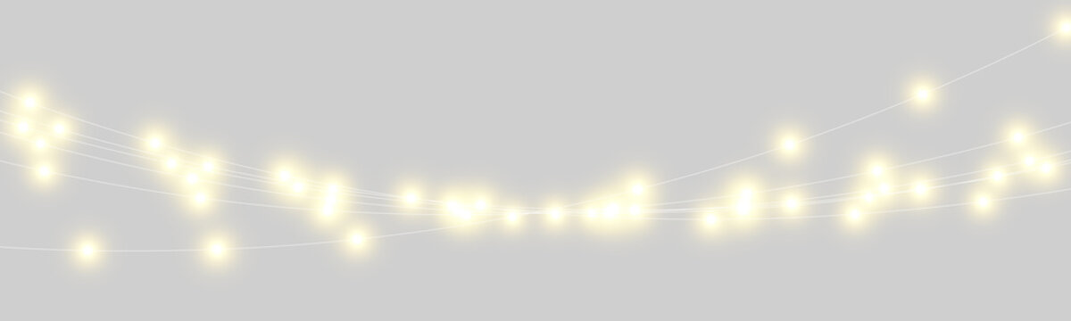 Curved strings of glowing yellow light bulbs are suspended against a dark background. Each bulb emits a soft, radiant halo creating a warm and inviting visual effect.