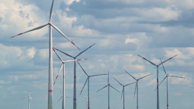 wind turbines against the sky 4K