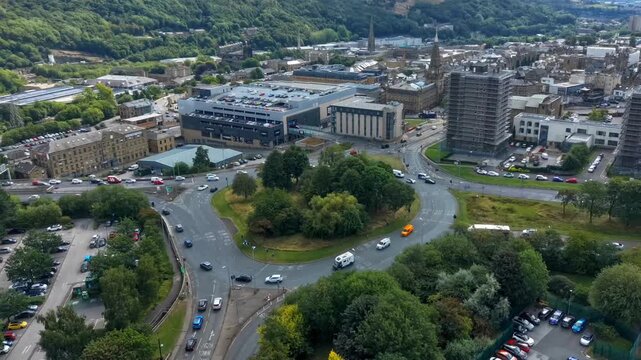 ​High Angle Aerial Drone View of City Roundabout with Traffic Flow, Halifax, West Yorkshire