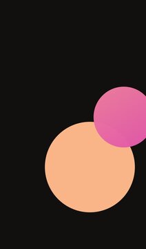 Abstract design with two overlapping circles in orange and pink colors on a solid dark black background