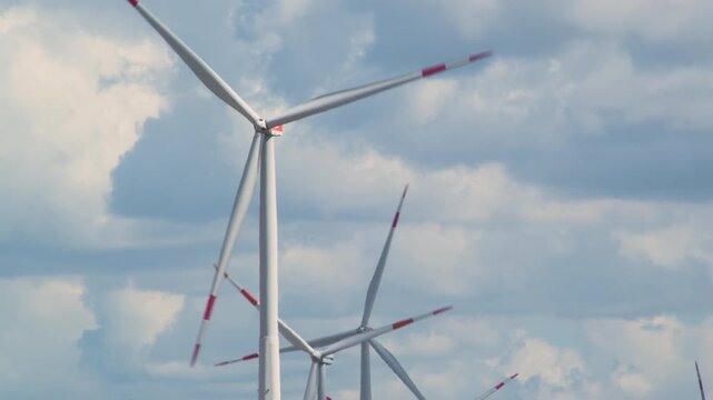 wind turbines against the sky 4K