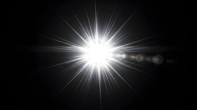 Bright starburst effect on a black background creating a dramatic light flare