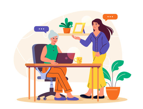 Senior Woman Learning Computer with Young Assistant