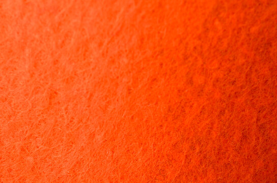 Vibrant Orange Fibrous Fabric Texture for Abstract Background and Design