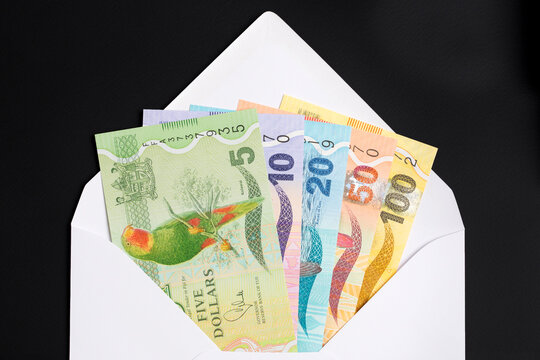 Fijian dollar in a white envelope
