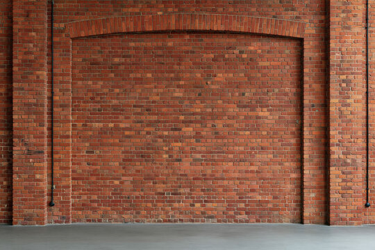 Historic Red Brick Wall with Industrial Arch