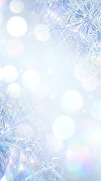 プリズムに輝く霜の結晶が淡い青背景を飾る縦長動画