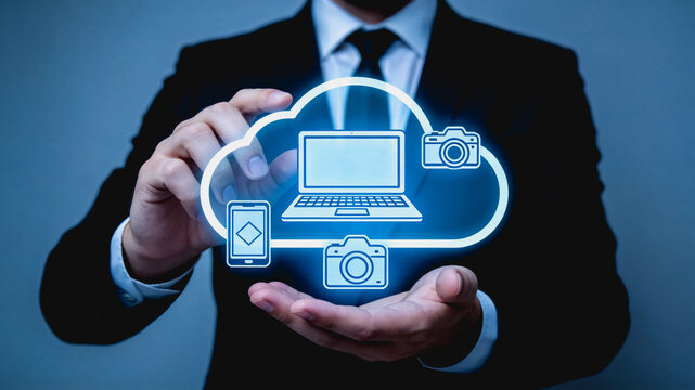 Businessman showing cloud computing connected to multiple smart devices