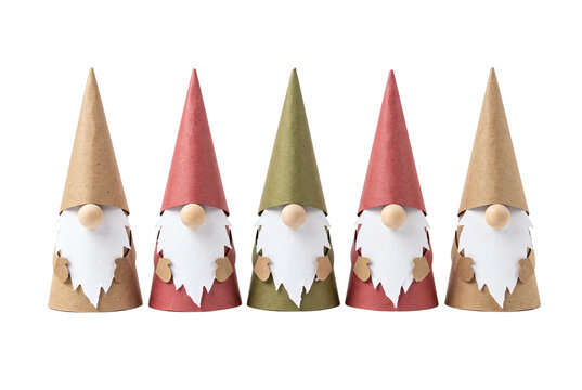 Row of handmade paper Christmas gnomes with tall hats