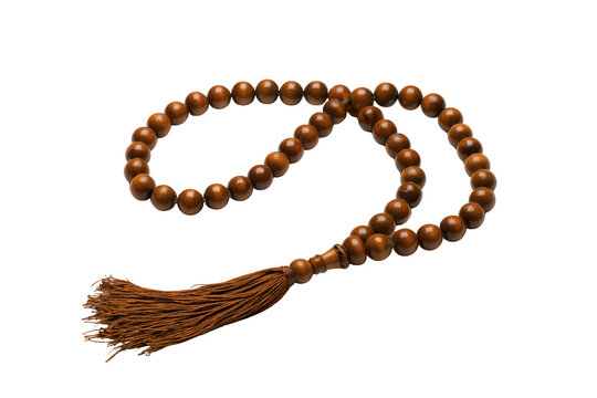 Polished wooden Islamic prayer beads (Misbaha) with tassel on transparent background for spiritual use
