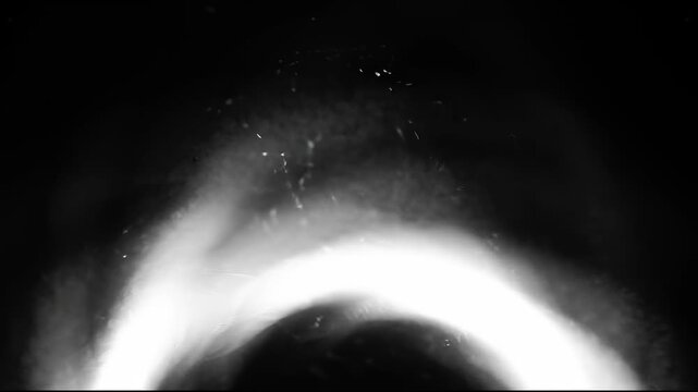 Sweeping Curved Light Leak in Deep Black with Bright Stark White Tones and Radiant Bottom Glow
