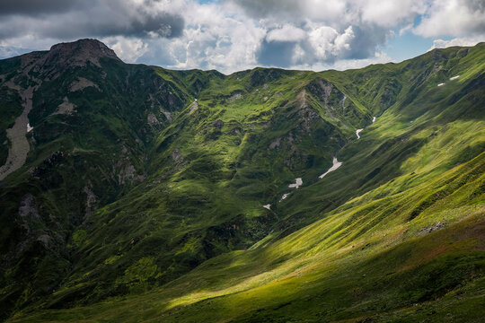 Mountain landscape in Svaneti on cloudy summer day. Caucasus peaks in Georgia. Amazing view on wild georgian nature.	