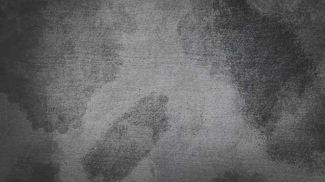 Soft gray grunge texture background with subtle grain, faded surface detail and minimalist weathered character for elegant cinematic and graphic design use