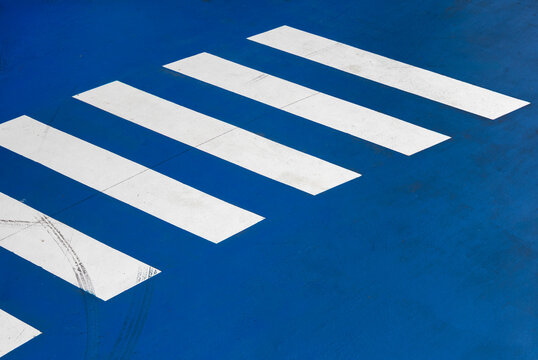 zebra crossing on blue road