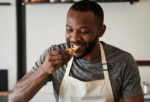 Culinary quality control and food tasting, professional chef testing a dish in a restaurant kitchen with focus and satisfaction for gourmet cooking