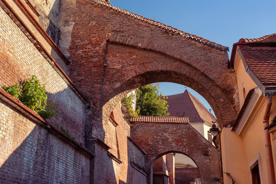 Medieval brick arches of the Stairs Passage in the historic old town of Sibiu Transylvania Romania